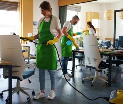 professional-cleaning-service-person-using-vacuum-cleaner-office_23-2150520631